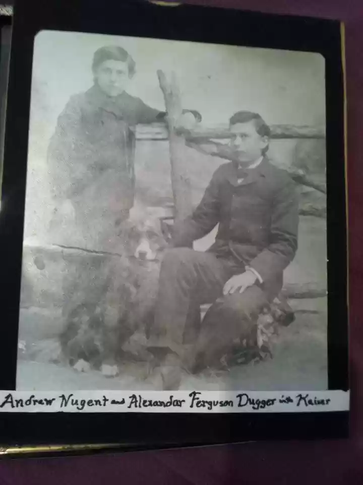 Alexander and Andrew Dugger with dog
